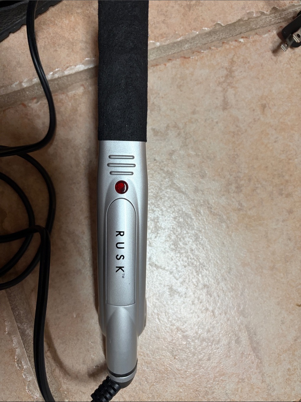 # 80.RUSK Silver and Black Hair Straightener